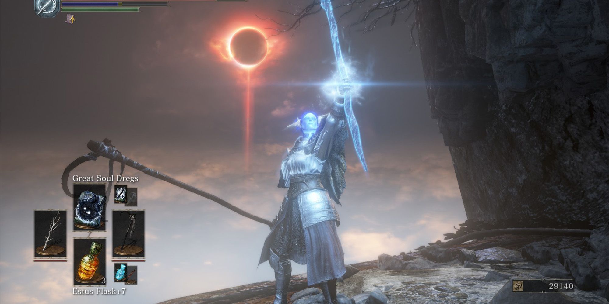 A player wielding the Murky Longstaff while wearing the Sunless Armor set in the Ringed City DLC in Dark Souls 3