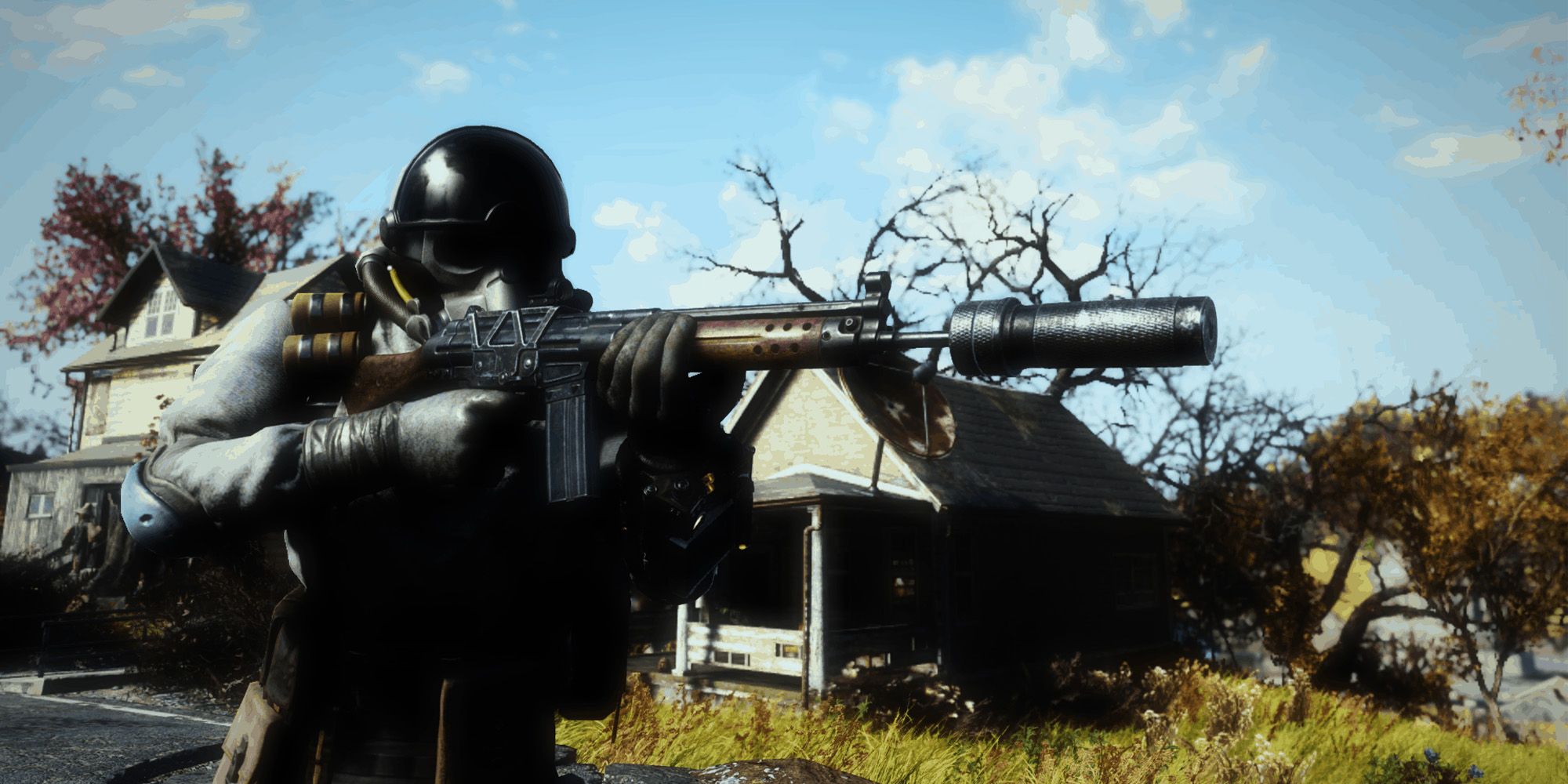 The main character wearing Combat Armor and using a silenced Combat Rifle for a Bloodied Ranged Build in Fallout 76.