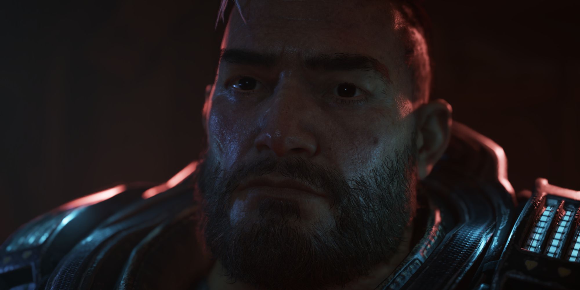 Gears Tactics an extreme close up of Gabriel Diaz in a cutscene against a black backdrop