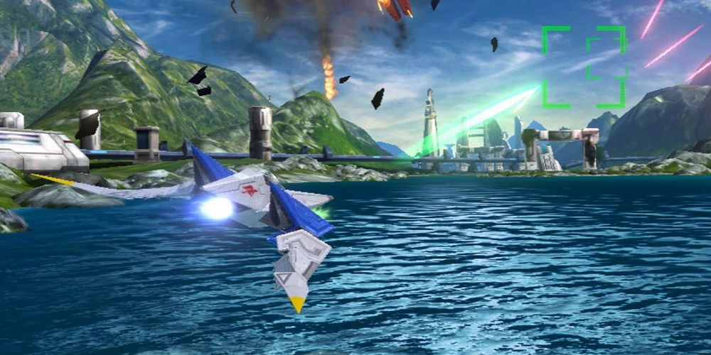 Star Fox Zero: An Arwing flies close to the water while firing a laser. 