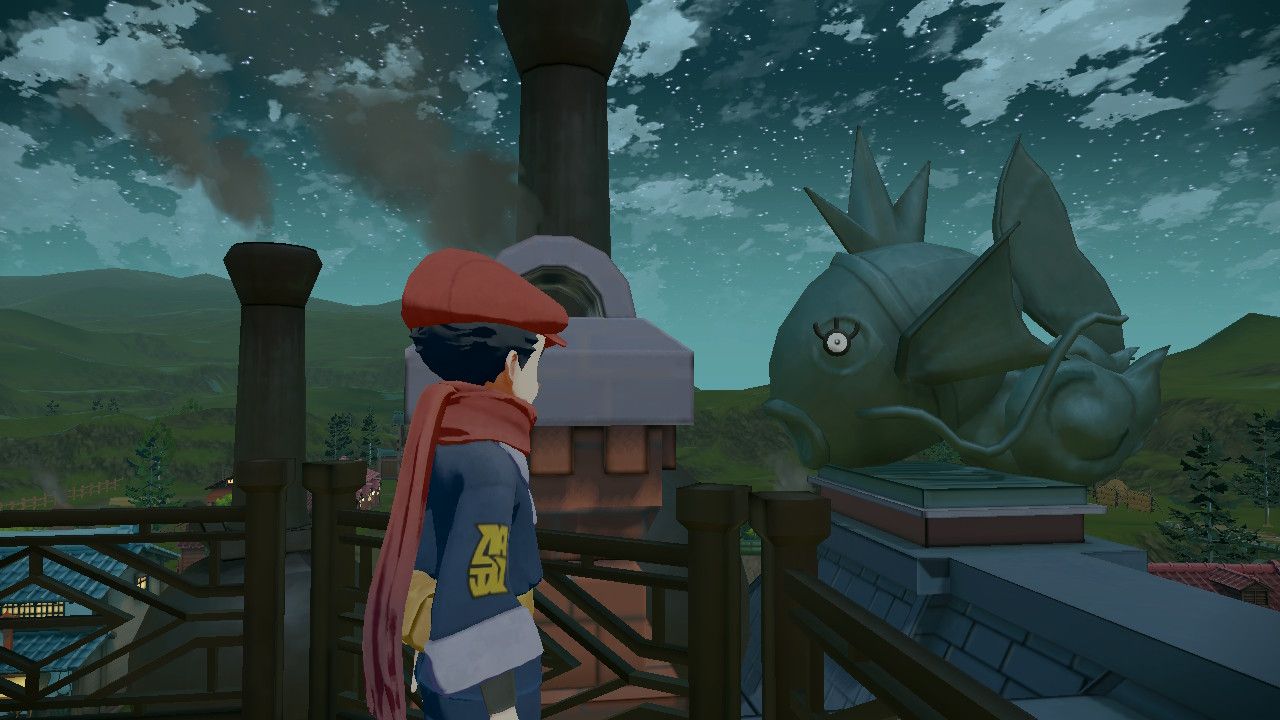 Pokemon Trainer looking at Unown W sitting in the eye of a Magikarp statue in Jubilife Village, in Pokemon Legends Arceus.
