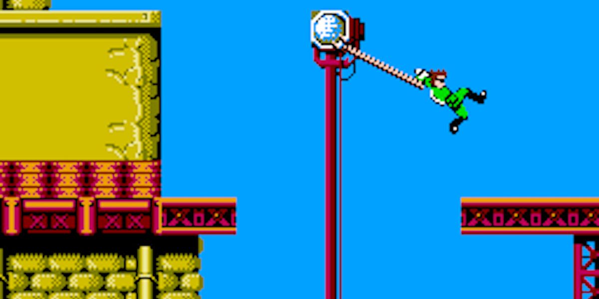 Rad Spencer using his mechanical arm to swing around in Bionic Commando for the NES.