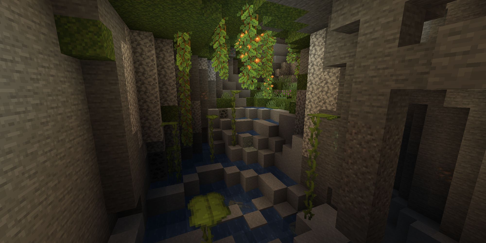 small lush cave with dripleaf growing