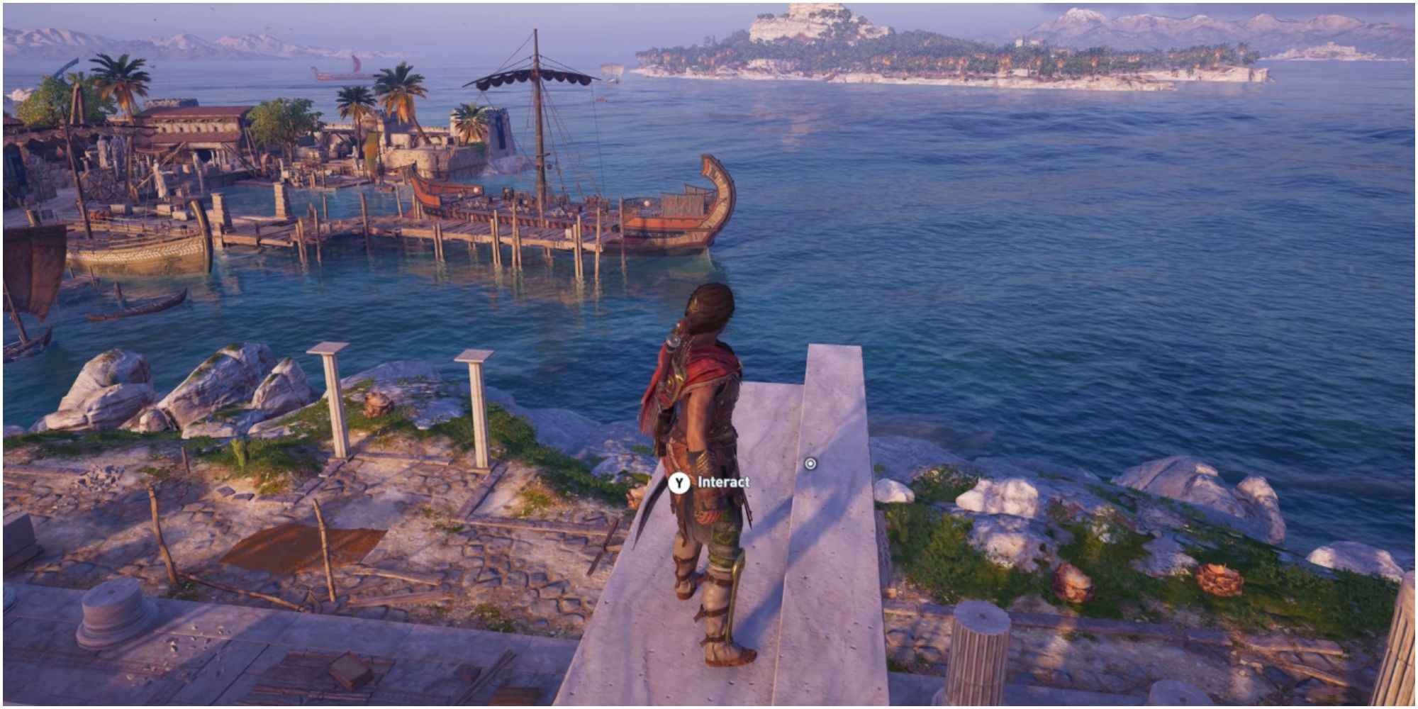 The main character interacting with the engraving on top of an archway.