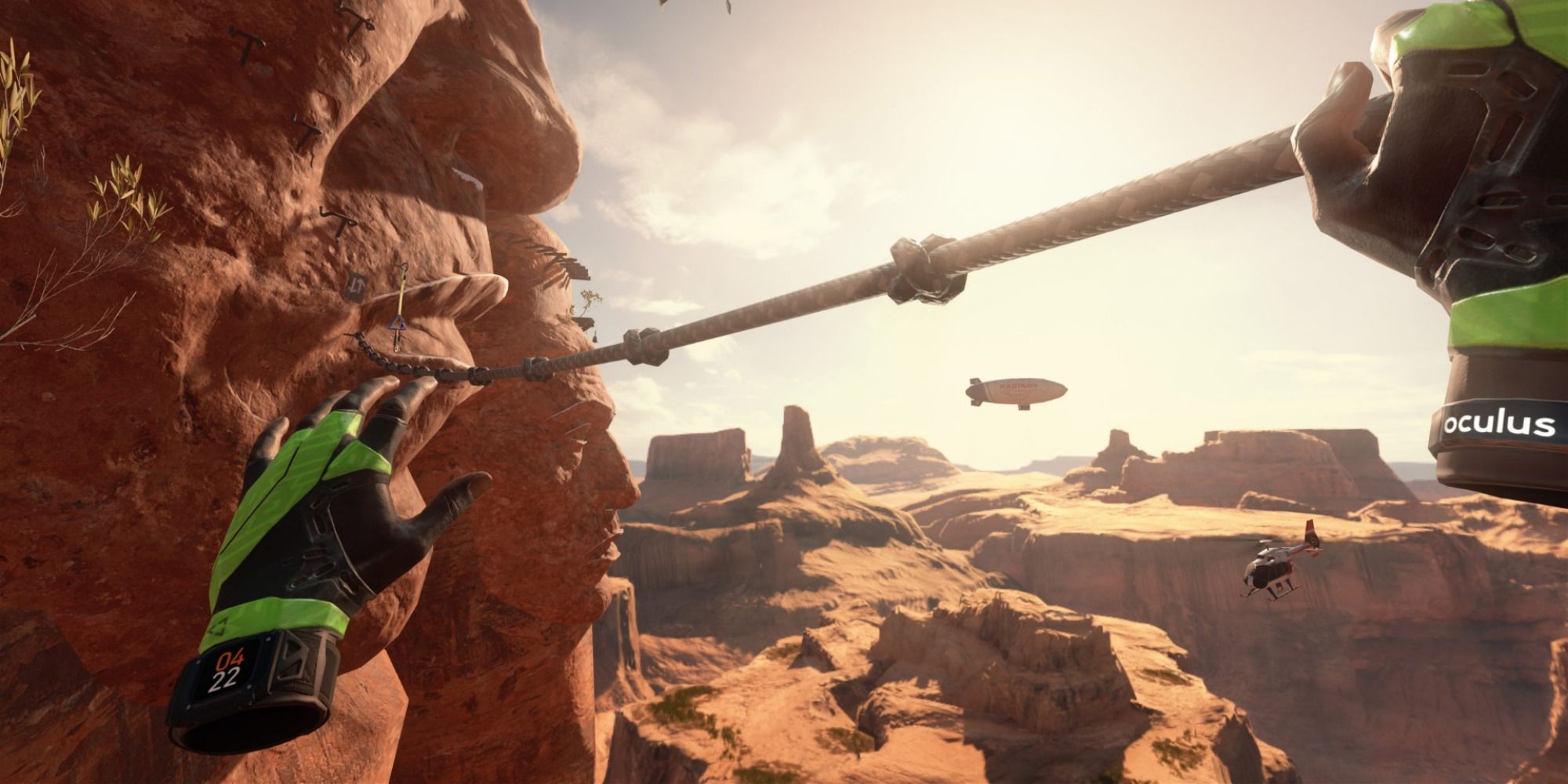 A pair of floating gloves grips a taut rope, climbing across a desert canyon with helicopter and blimp in the background