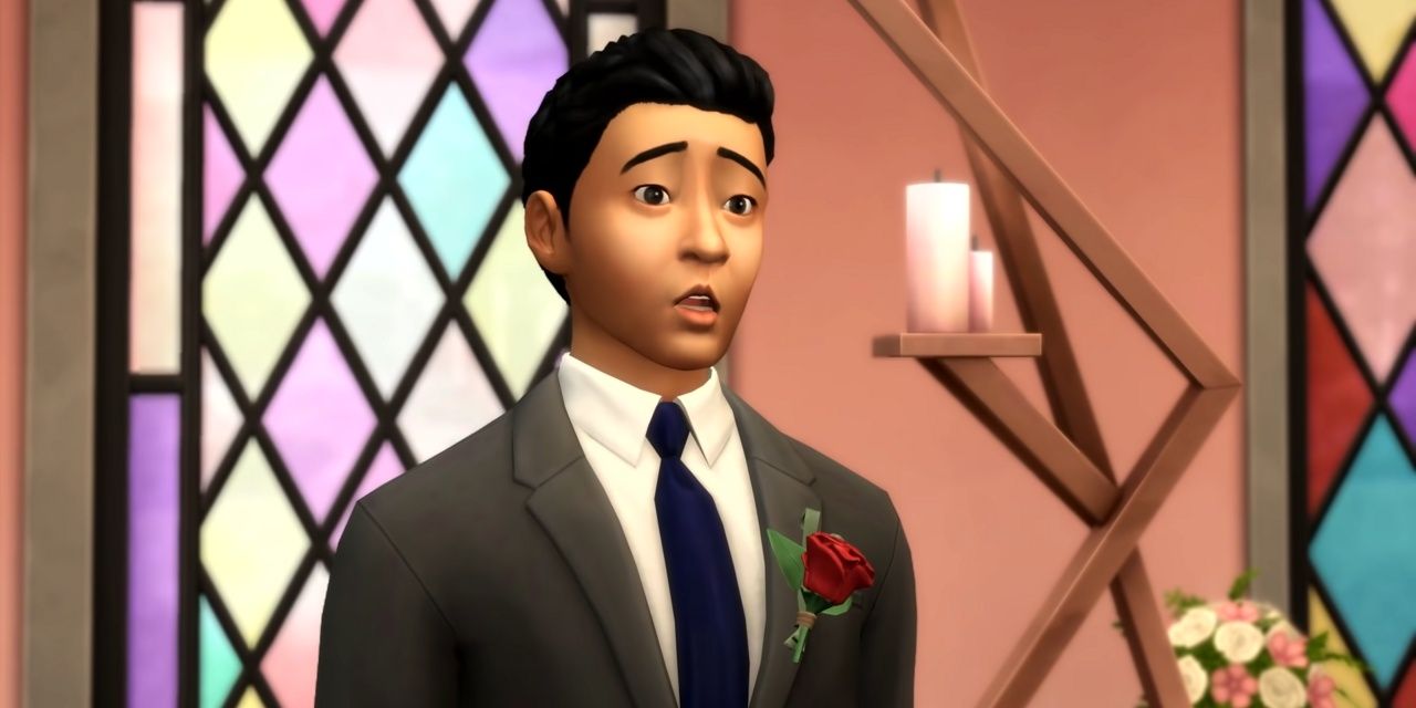 A groom looks shocked as their bride (not pictured) leaves them at the alter for another Sim