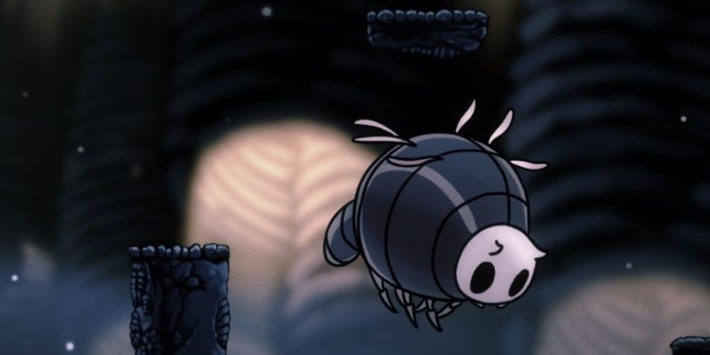 A Boofly in Hollow Knight floating between platforms.