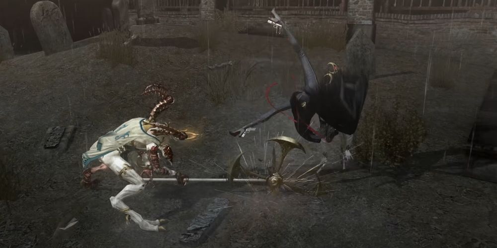 Bayonetta dodges the swing of a staff gracefully 