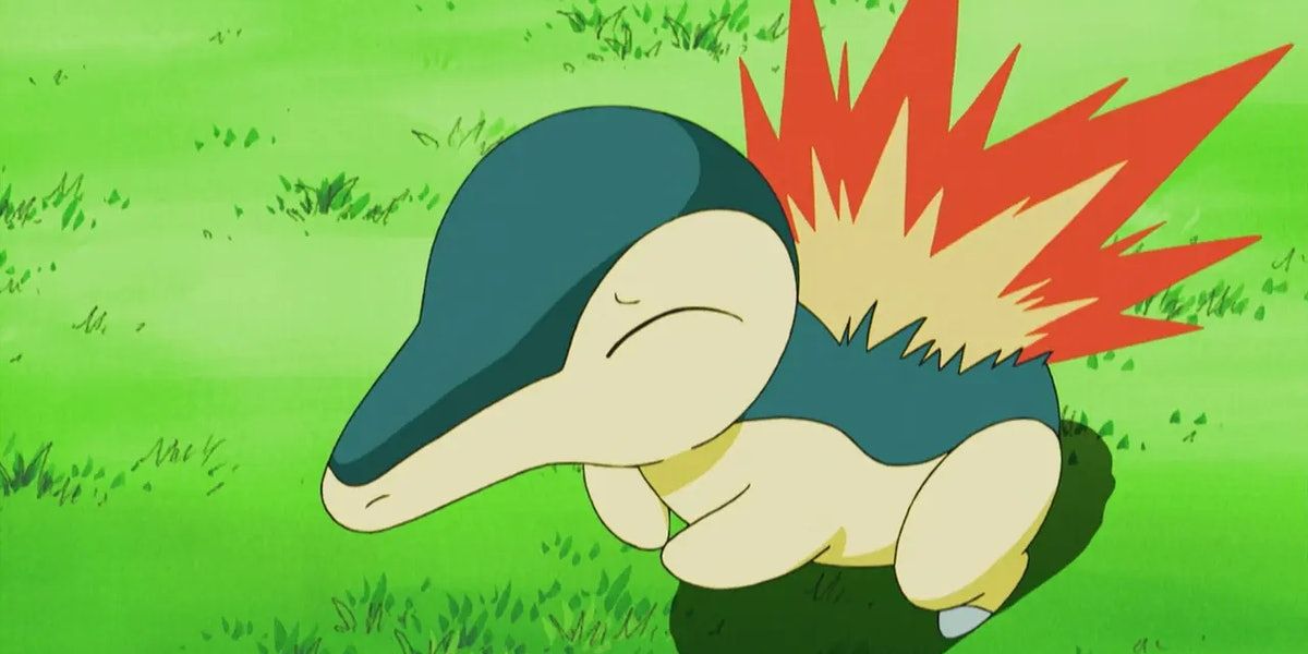 Cyndaquil with his back lit up in flames in the Pokemon anime