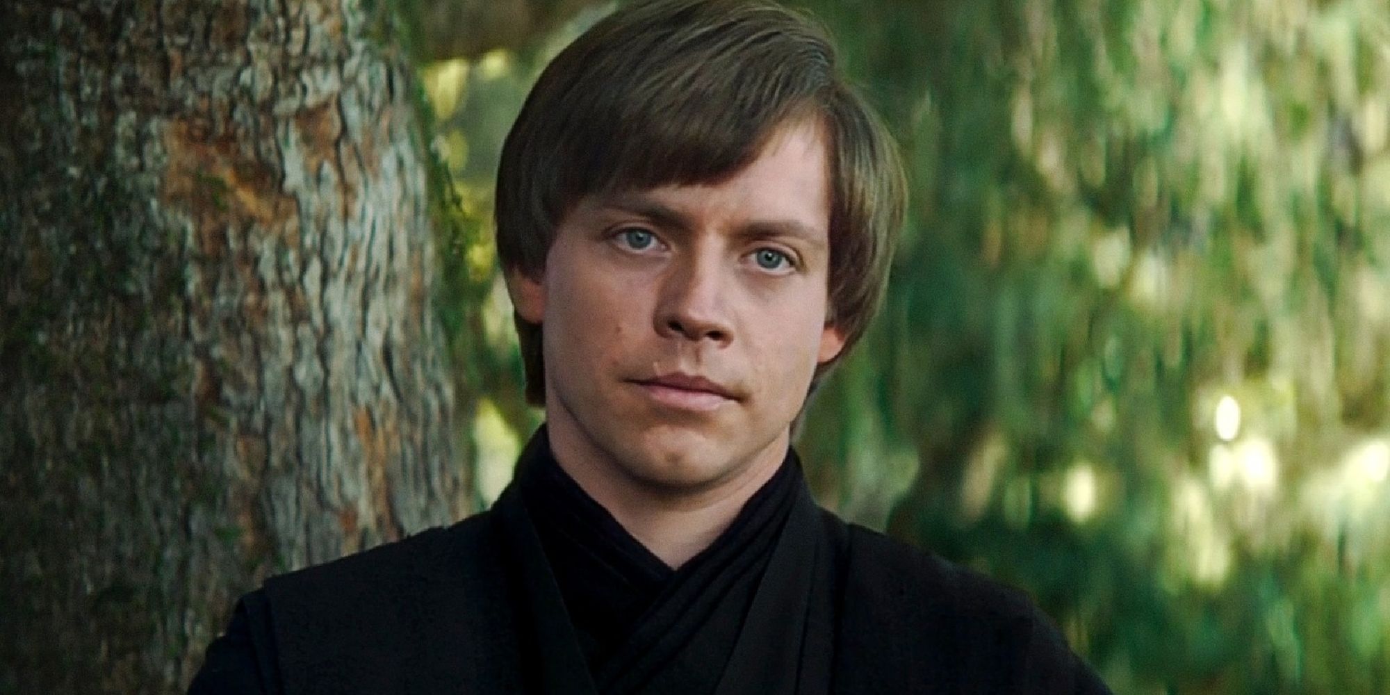 Deepfake Luke Skywalker in his black outfit standing in front of a tree