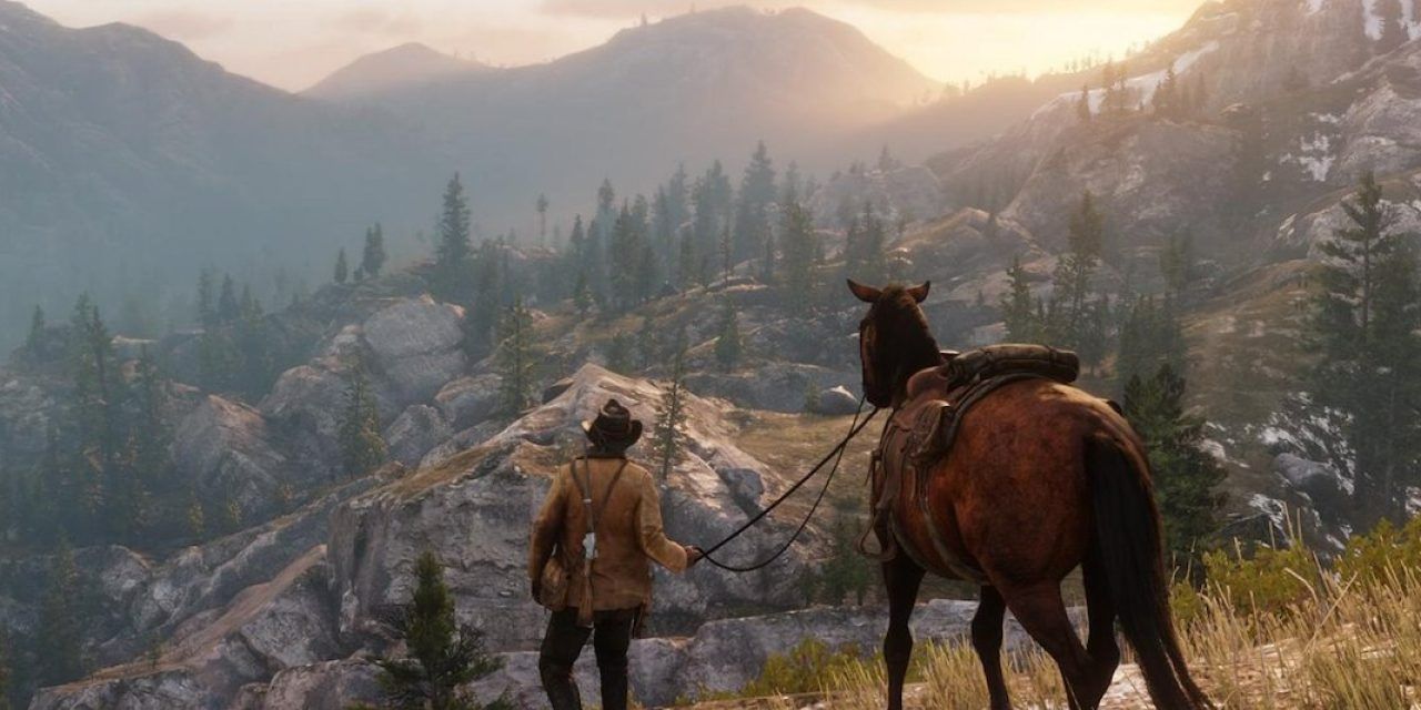 A beautiful screenshot of Arthur Morgan and his horse looking at a mountain range in Red Dead Redemption 2