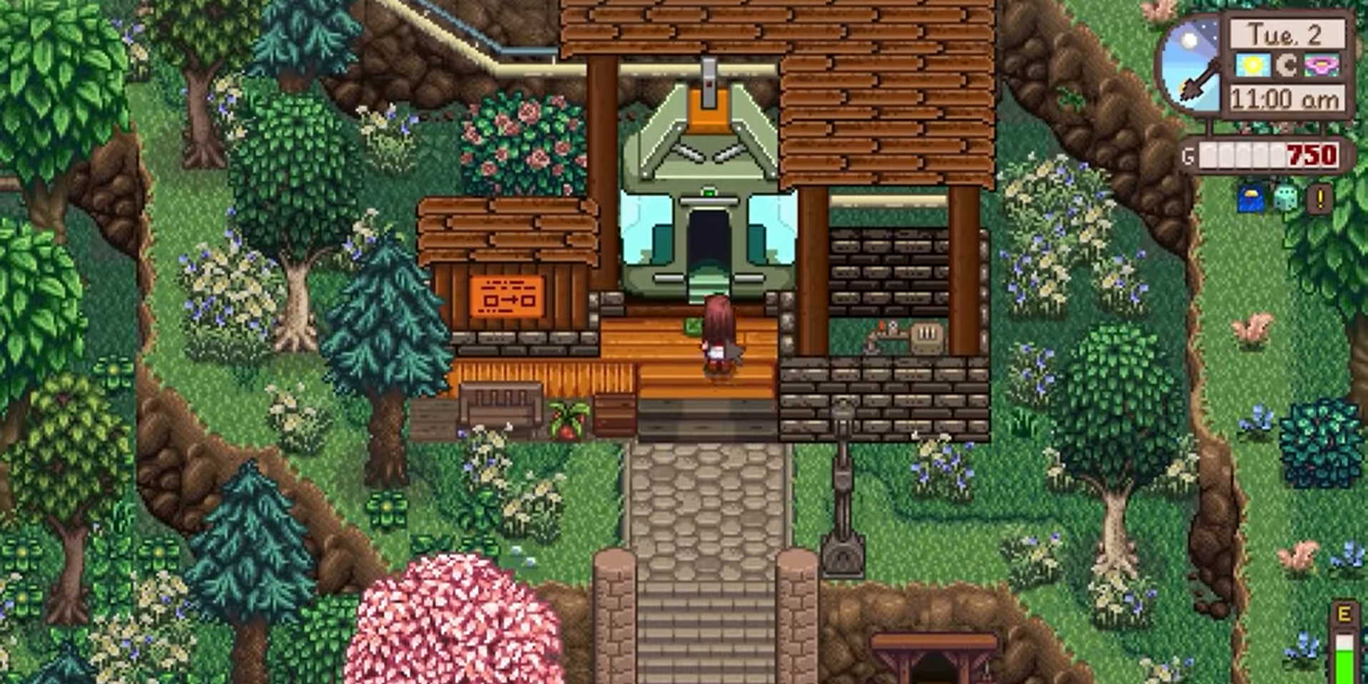 A farmer enters the cable car that brings them to Ridgeside Village. Around the platform, trees and grass cover the raised land around a centered stone path.
