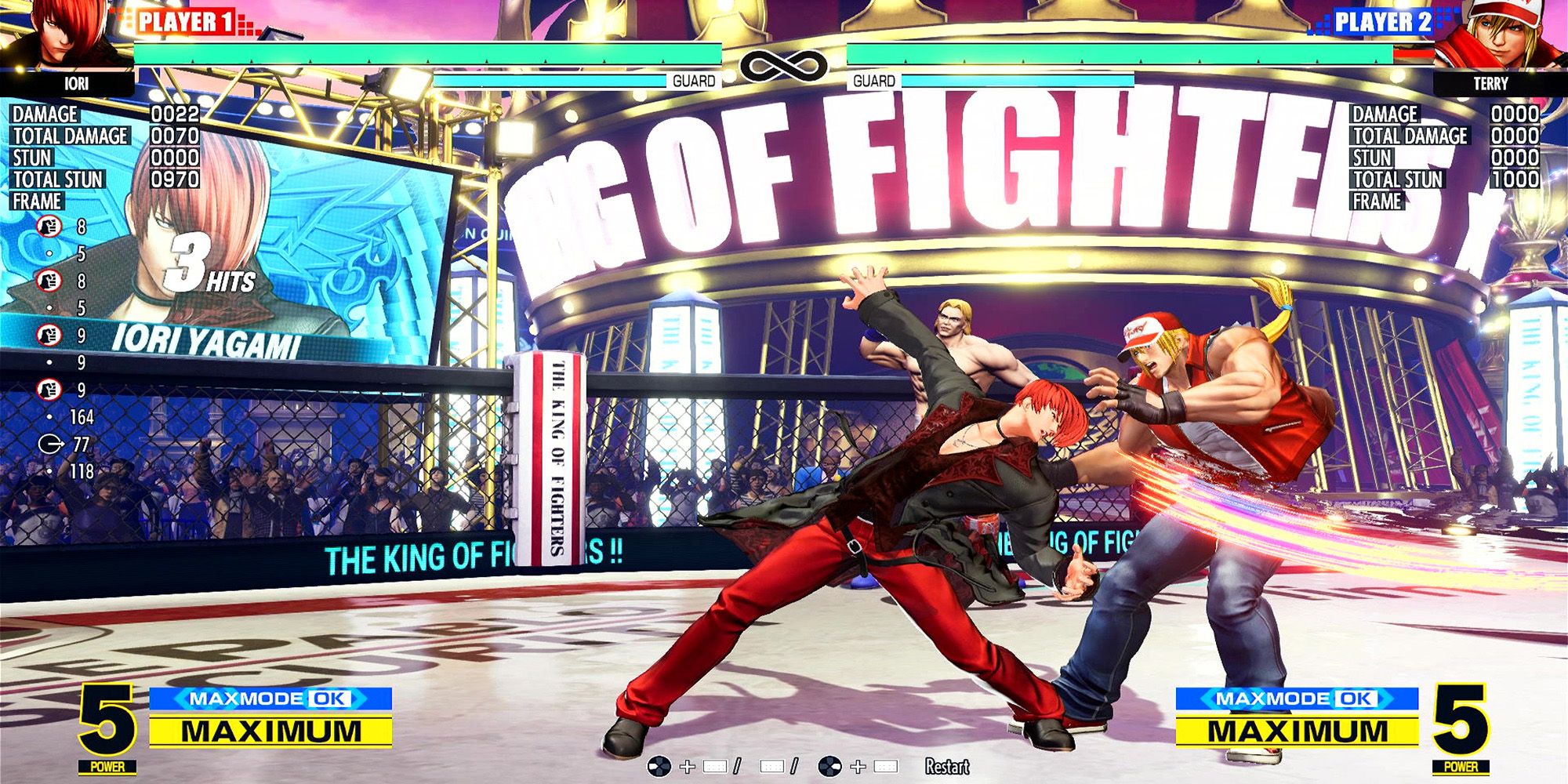 Iori hits Terry with a rush combo at the Hyper Galaxy Ring in The King Of Fighters 15.