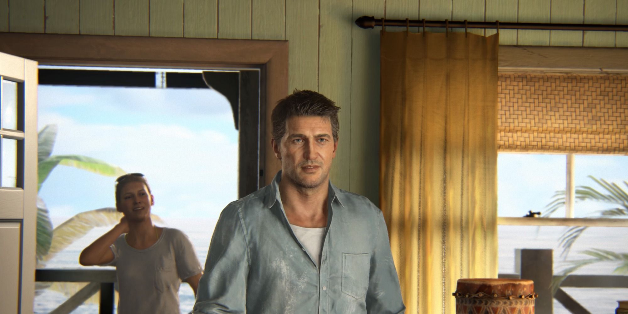 Screenshot from Uncharted 4's ending showing an older Drake and Elena entering their house