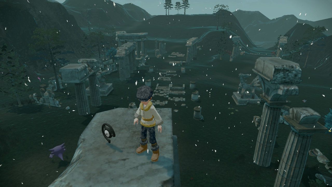 Pokemon Trainer standing beside Unown C above some ruins, in Pokemon Legends Arceus.