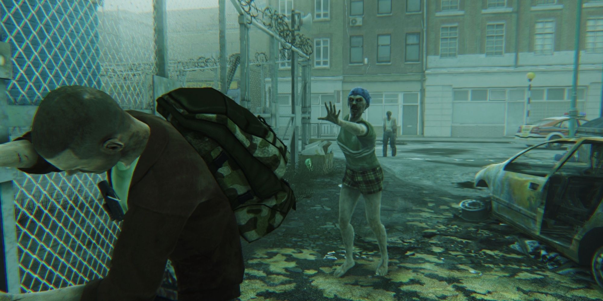 Zombi Screenshot Of Undead Attacking Survivor