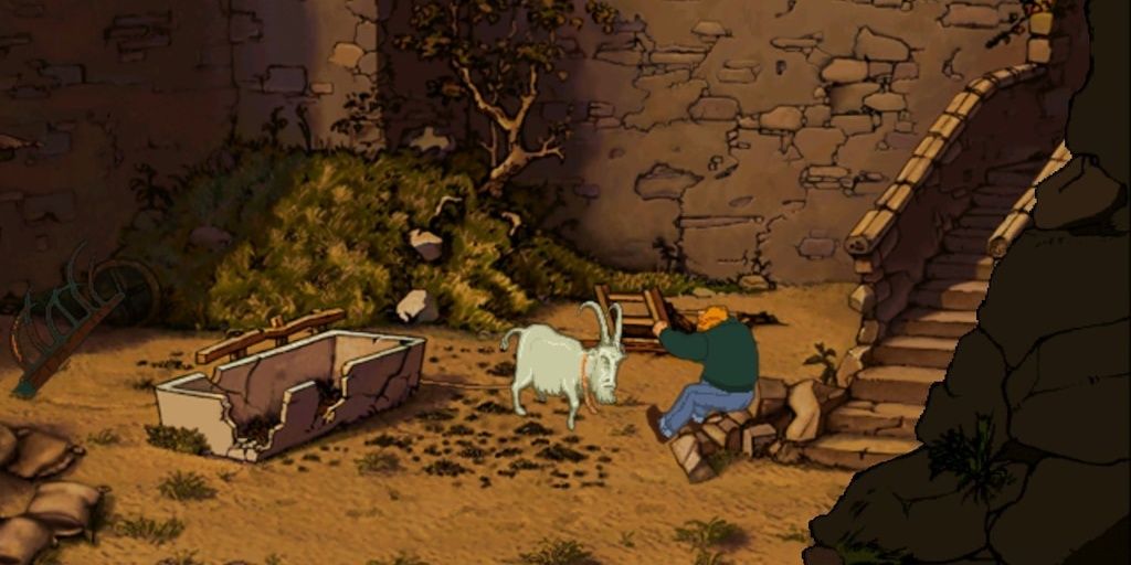 A screenshot showing George Stobbart being knocked down by a goat in Broken Sword: The Shadow of the Templars