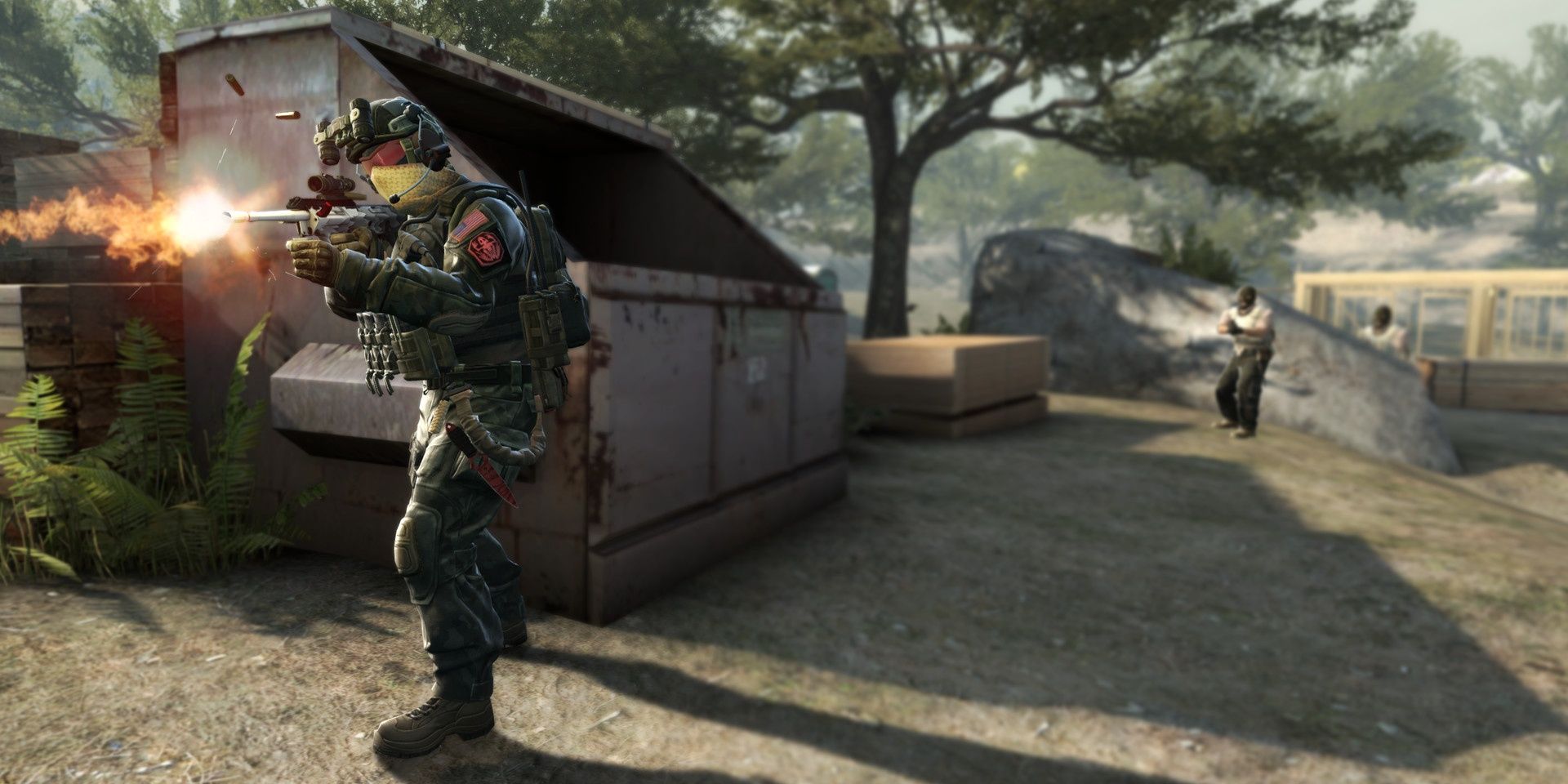 A screenshot showing a player firing a rifle in Counter-Strike:Global Offensive