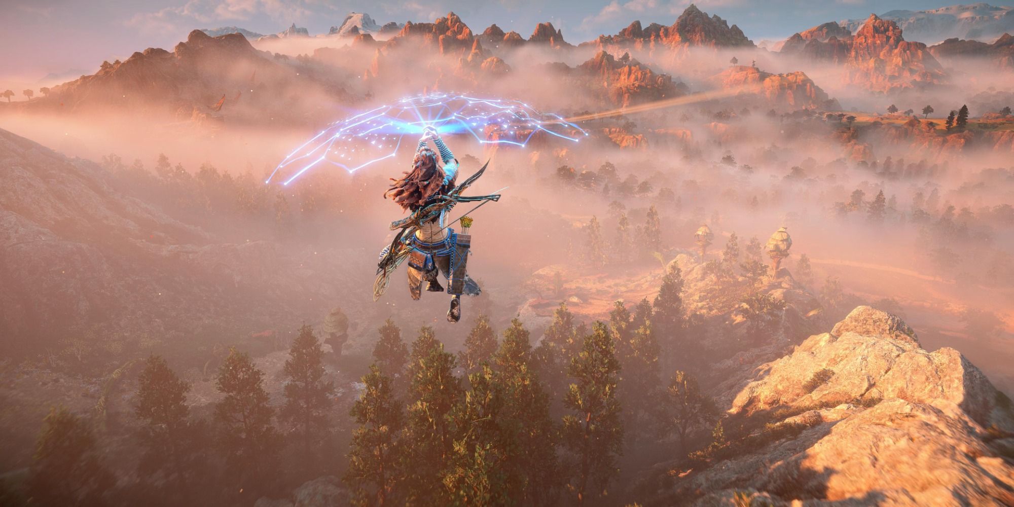 A screenshot showing Aloy paragliding in Horizon Forbidden West