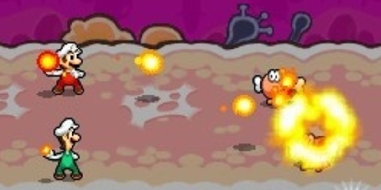 Mario & Luigi equipped with fire flowers attack enemies in Mario & Luigi: Bowser's Inside Story