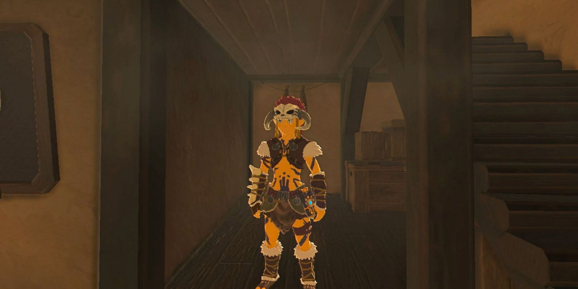 Link stands in a house while wearing the Barbarian Armor