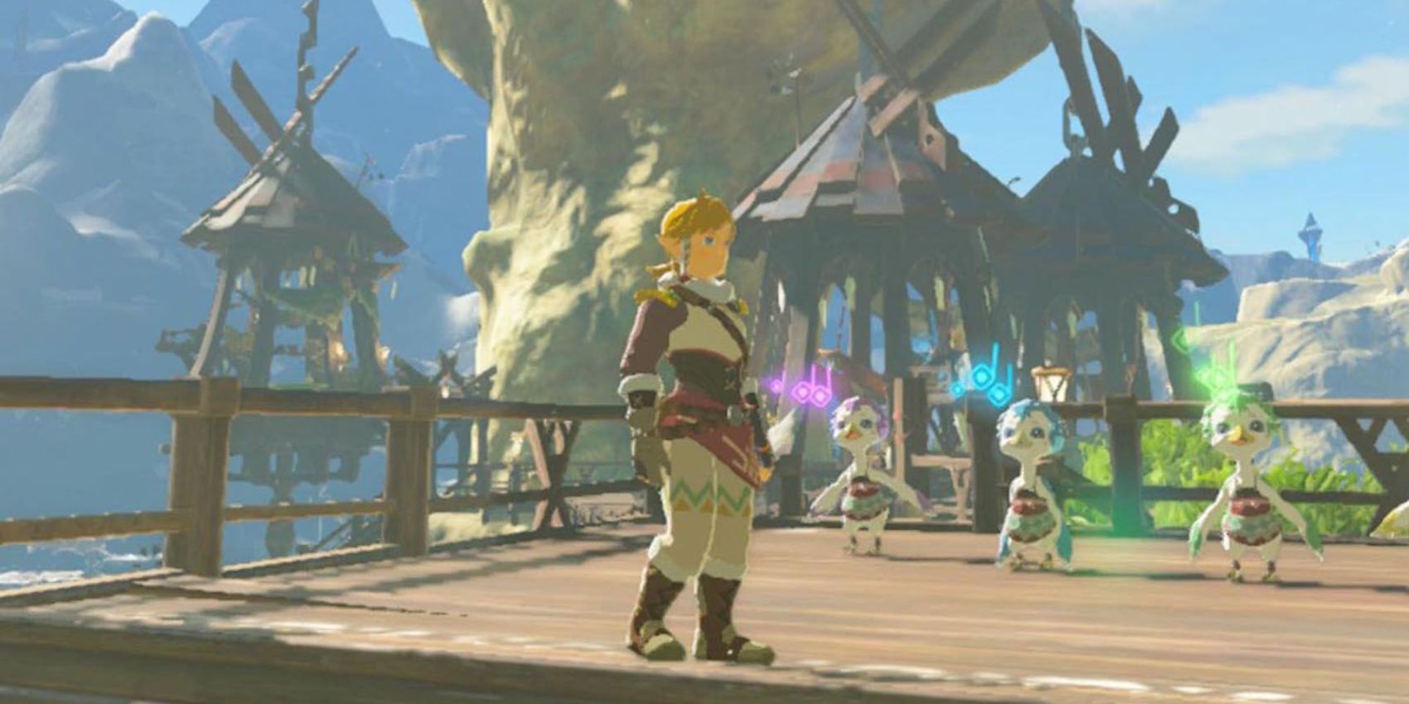 Link stands in Rito Village while wearing the Snowquill Set