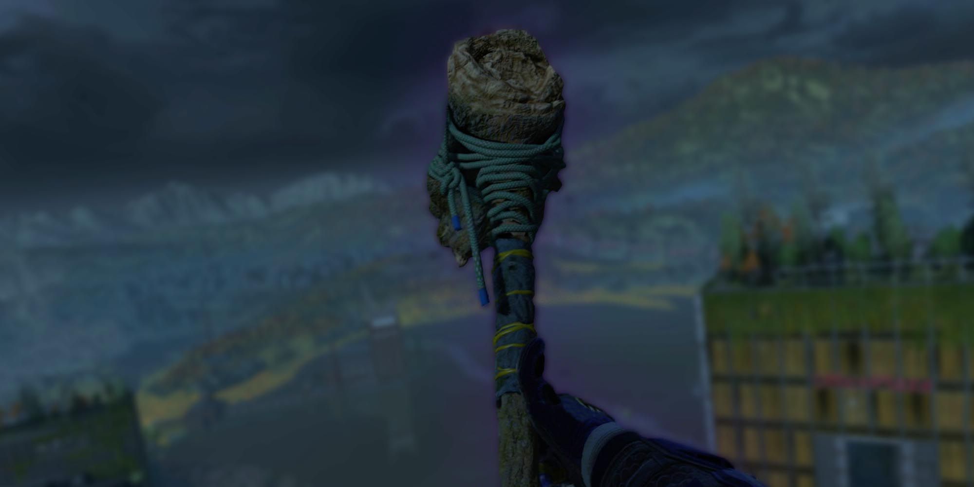 Aiden is flying over Villedor with a broom stick in Dying Light 2