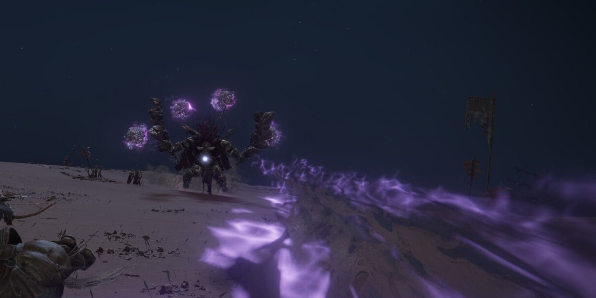 Starscourge Radahn launching gravity orbs at the player in Elden Ring