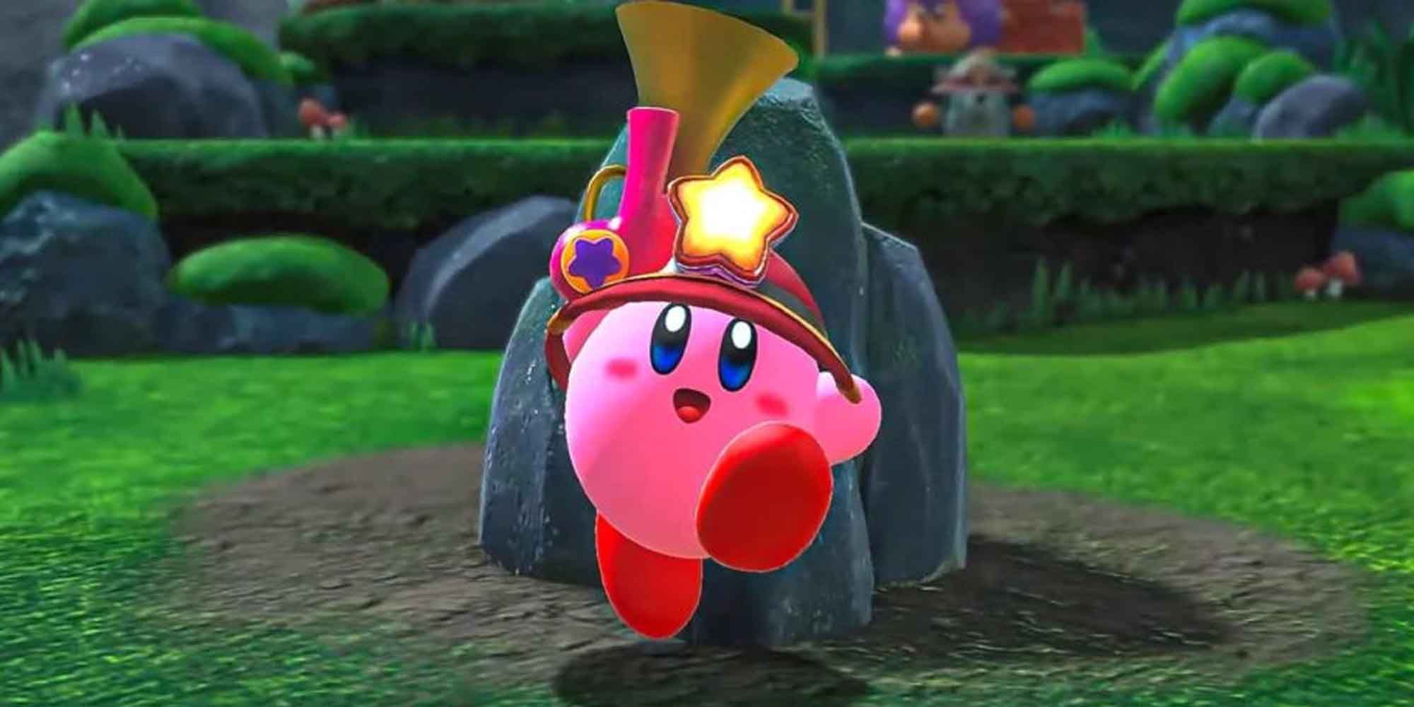 Kirby with a gun and a helmet jumping happily in front of a rock