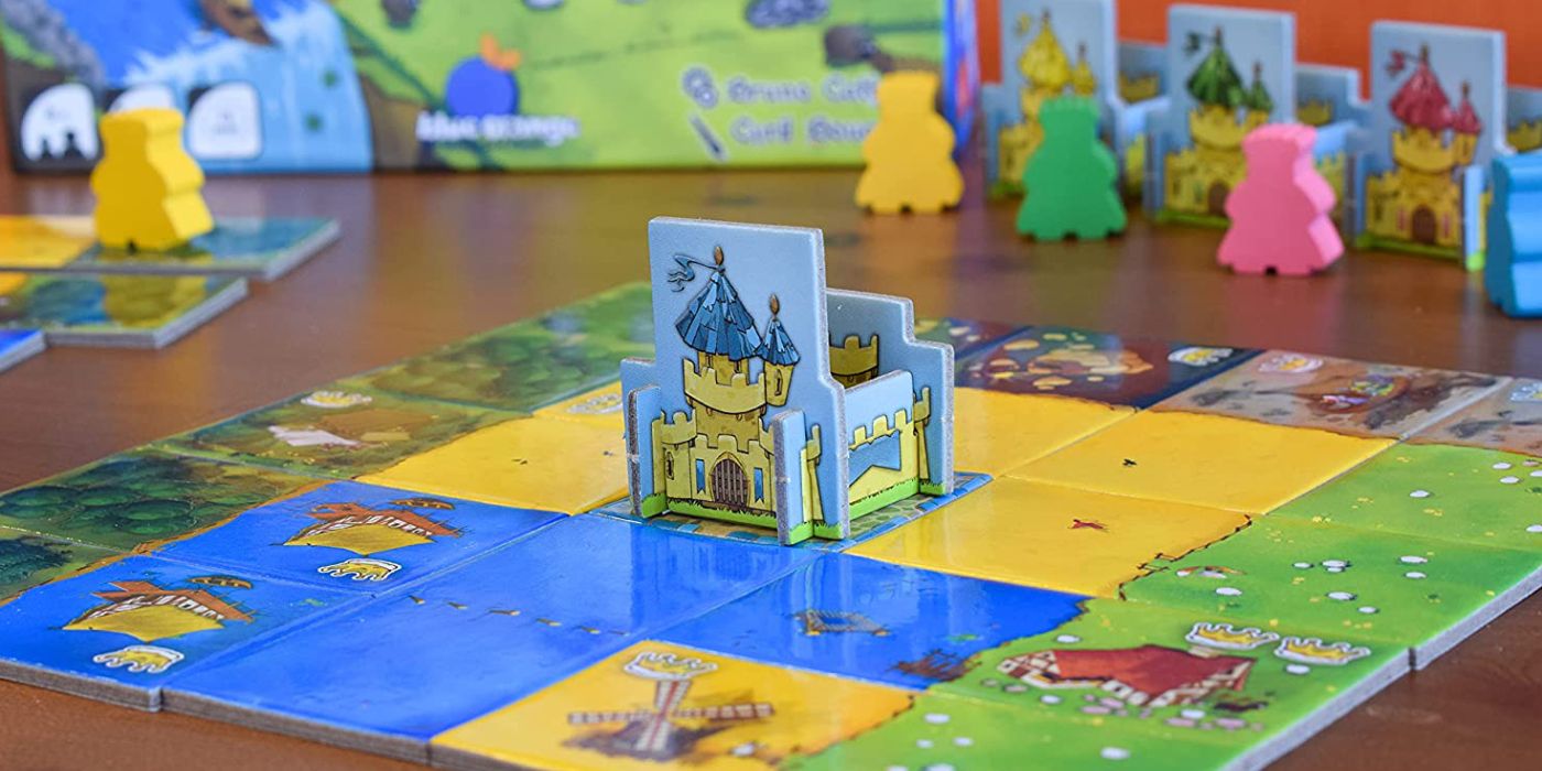 Kingdomino image of kingdom being built on a table