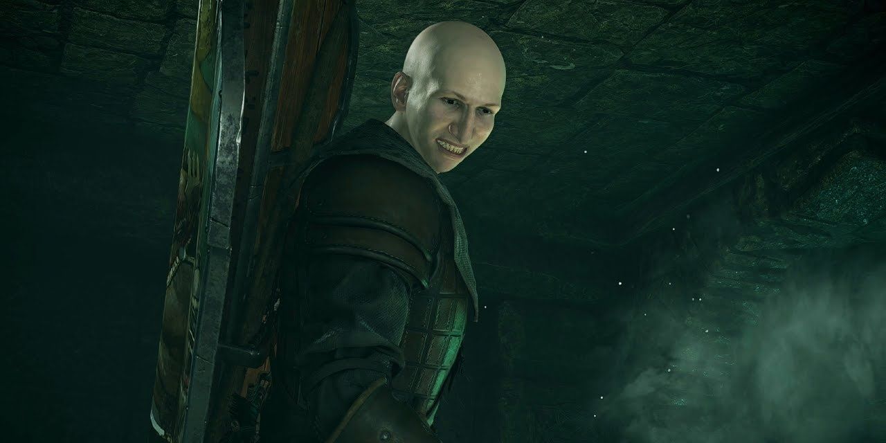Patches smiling in a dark catacomb