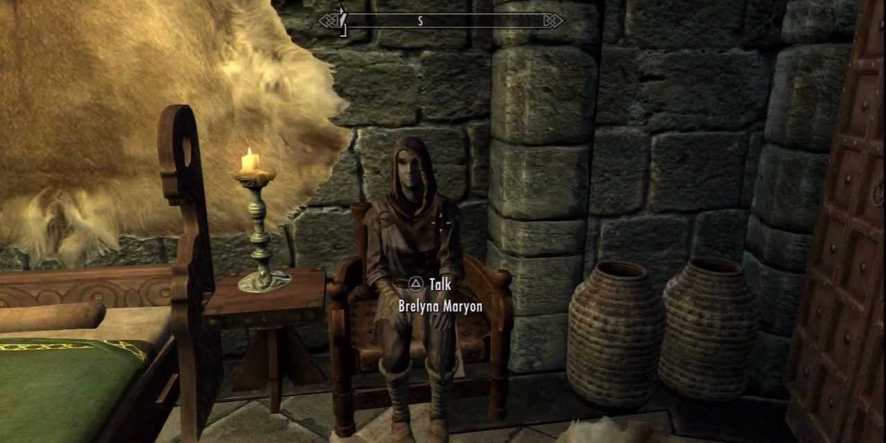 Brelyna Maryon sitting in her room in Skyrim.