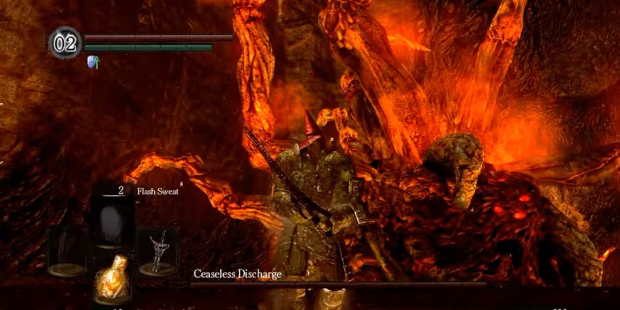The Ceaseless Discharge boss towers over the player in Dark Souls