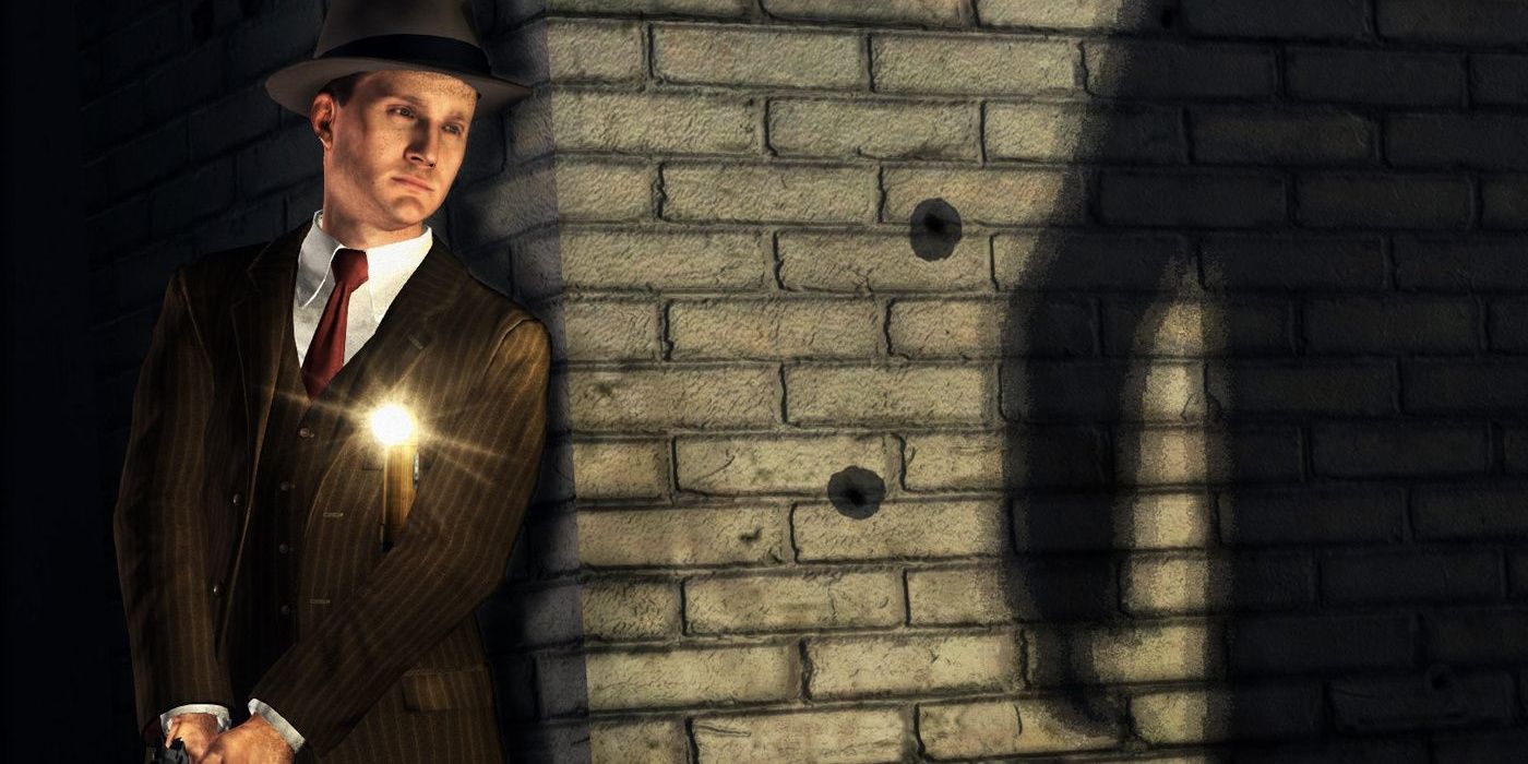 Detective Cole Phelps takes cover behind a wall in L.A. Noire