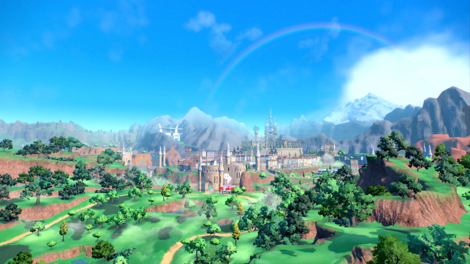 A screenshot of Pokemon Scarlet & Violet showing the overworld, a large city, and a large white building near mountains