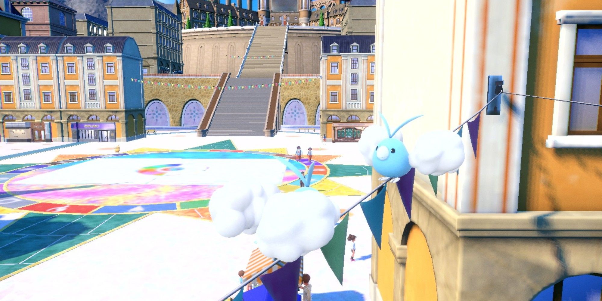 Screenshot of Pokemon Scarlet & Violet showing two Swablu perched on a line of flags in a town