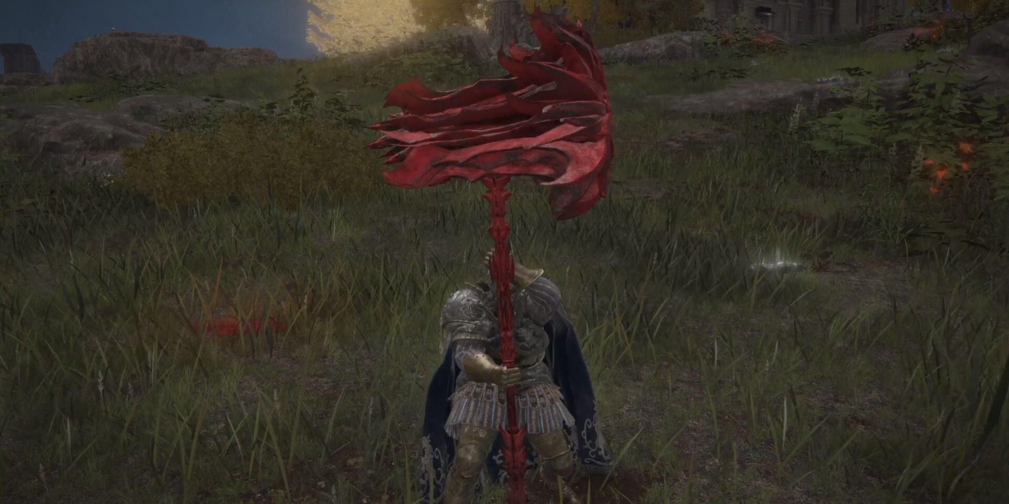 The Tarnished holding Prelate's Inferno Crozier in Elden Ring.