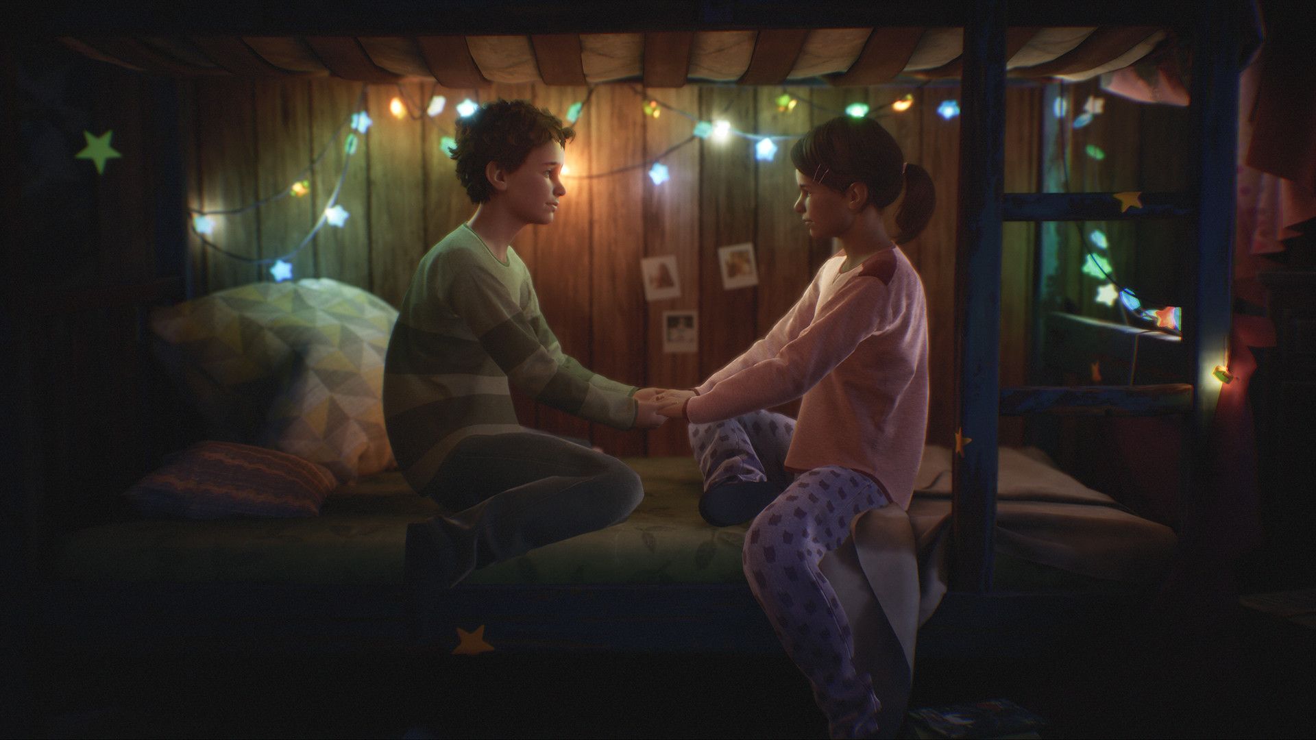 tyler and Ashley as children in their room, looking at each in Tell Me Why.