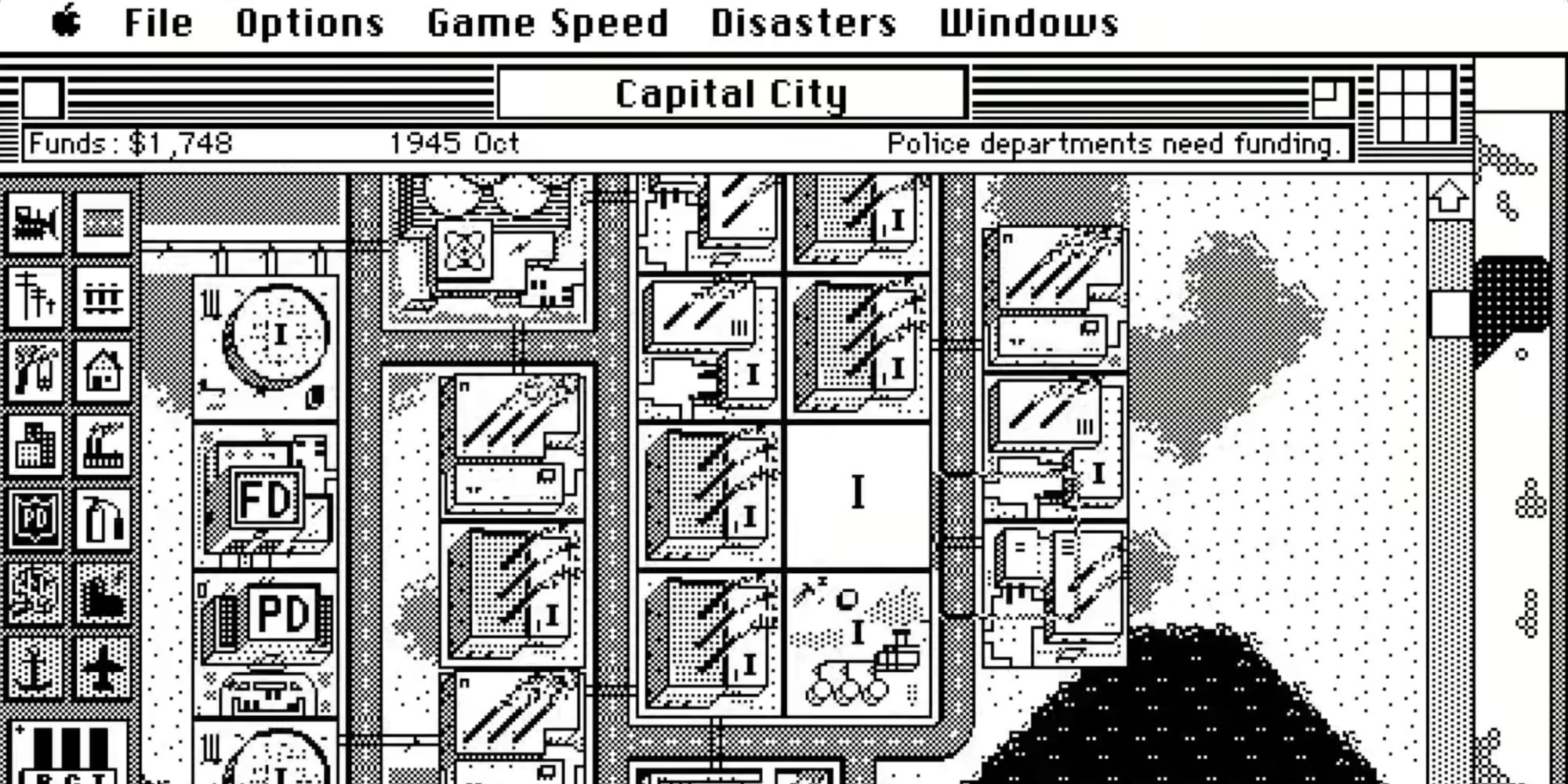 A screenshot from the original SimCity, running on a Mac, showing a black-and-white overview of the city's layout