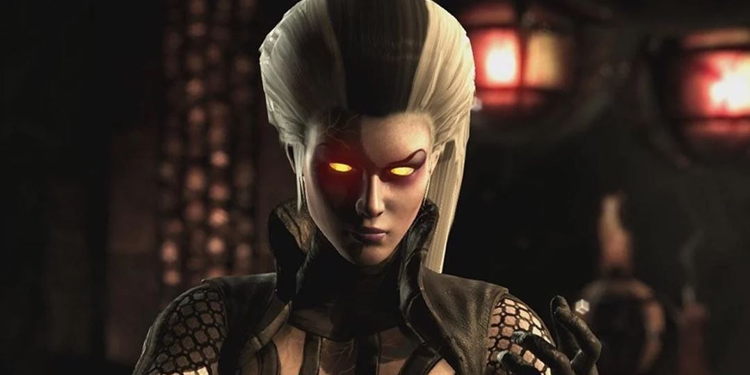 Sindel in Mortal Kombat, an imposing woman with black and white hair and glowing yellow eyes.