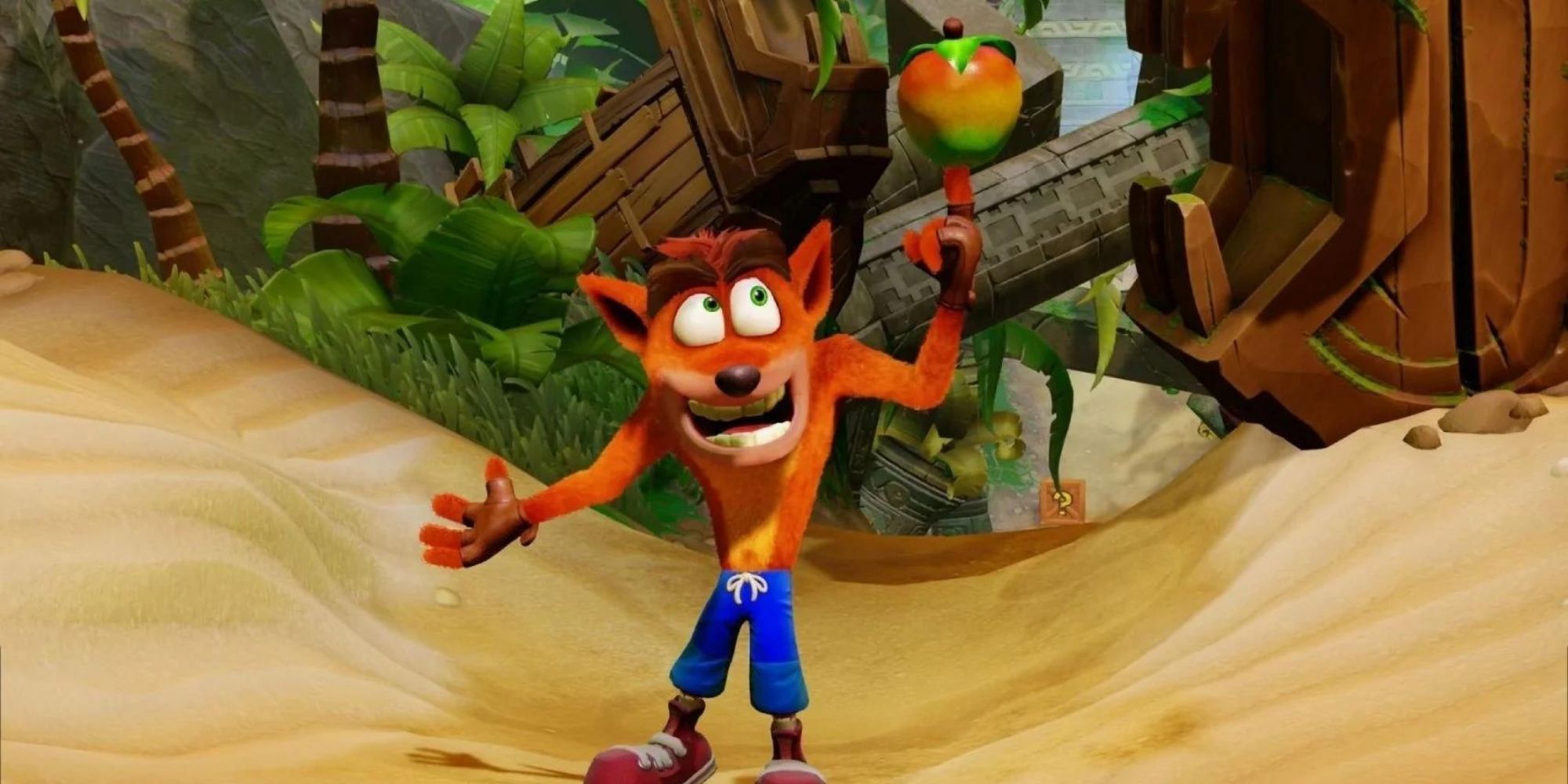 wumpa fruit being held by crash in crash bandicoot