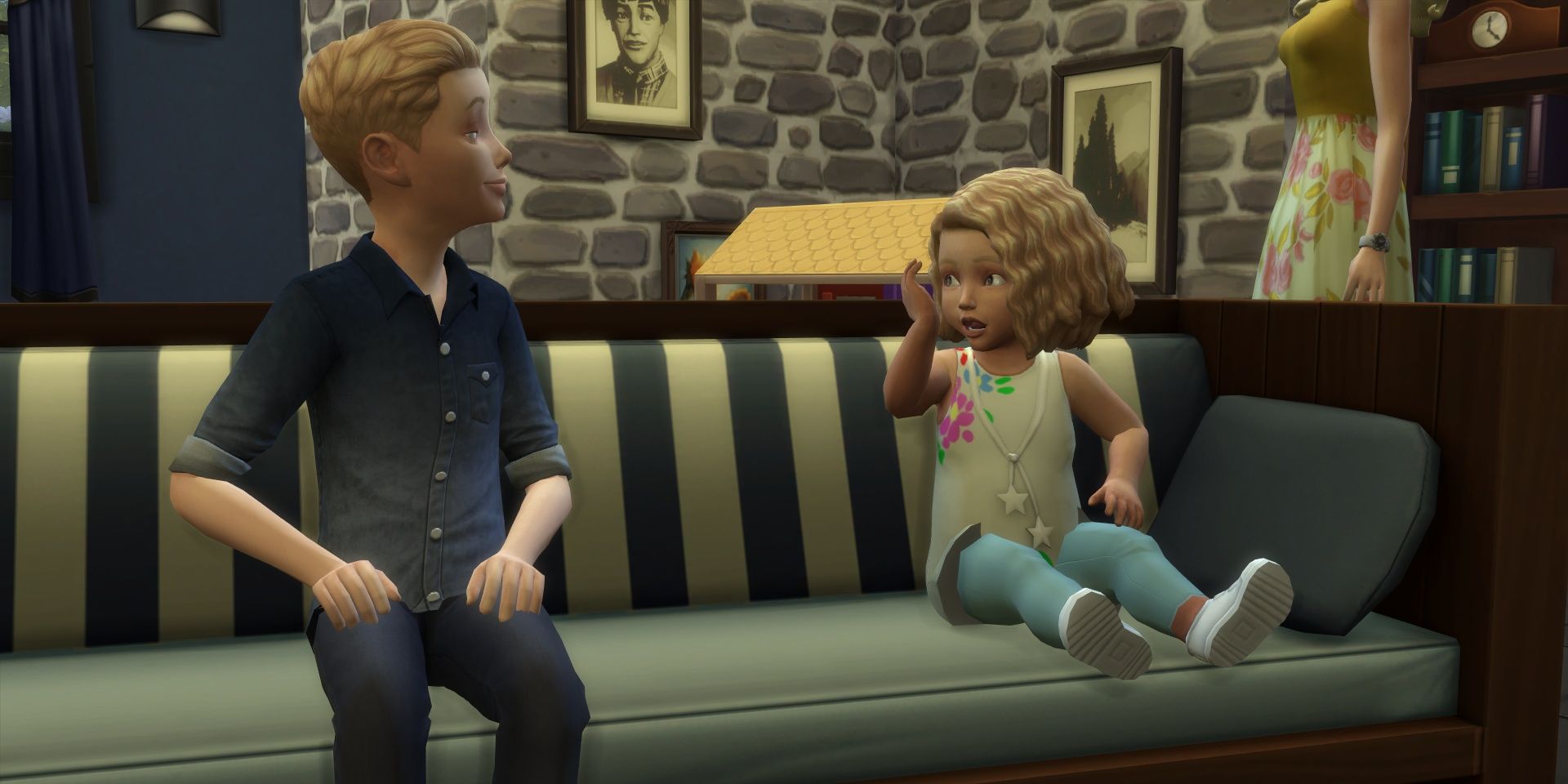 A toddler talking with a child in The Sims 4