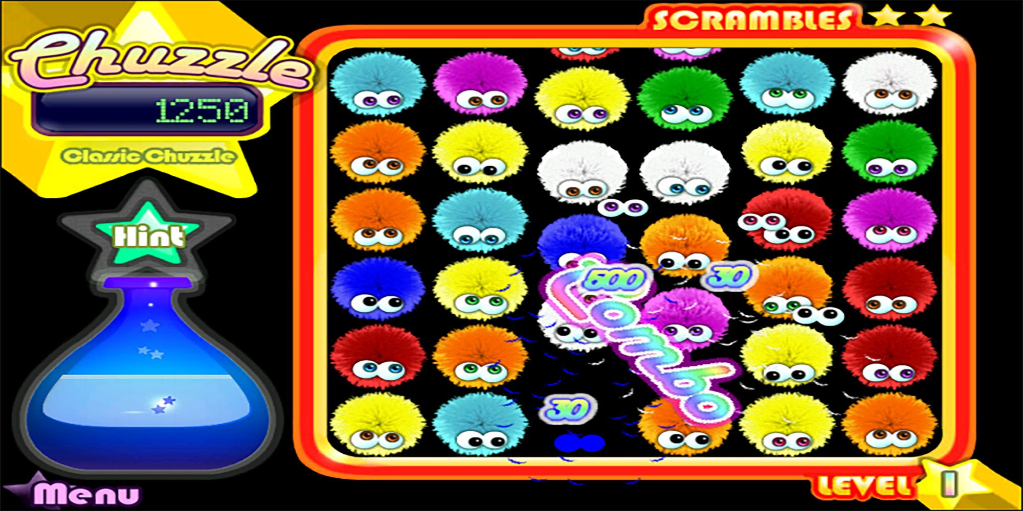 Colorful fuzzballs pop across the screen in Chuzzle for PC.