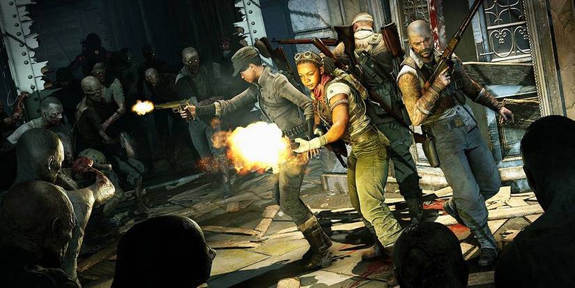 Shola, Karl, Boris and Jun discourage zombies in Zombie Army 4 Dead War.