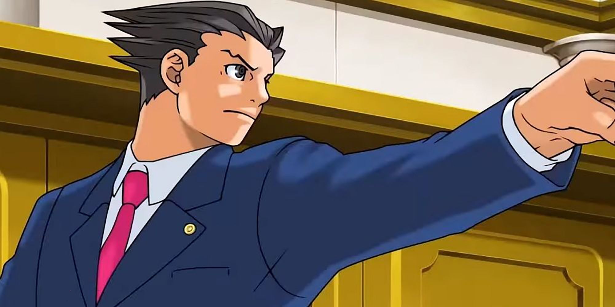 Phoenix Wright points in the court room in the Ace Attorney Trilogy.