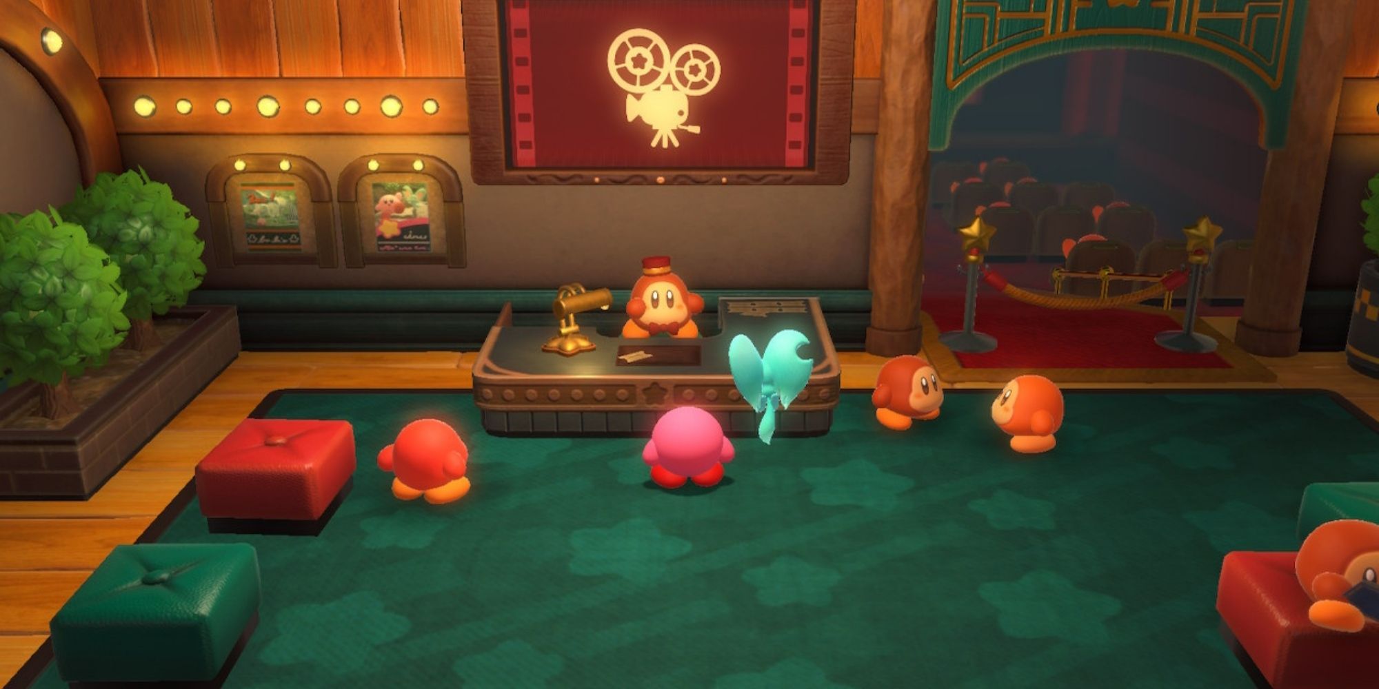 Kirby and the Forgotten Land Waddle Dee Cinema Kirby and Elfilin Stand By The Desk In The Cinema
