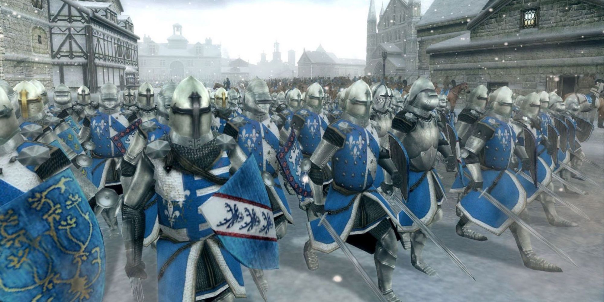 a wide shot of a group of knights clad in blue and white armour wielding swords and shields walking through a snow covered village