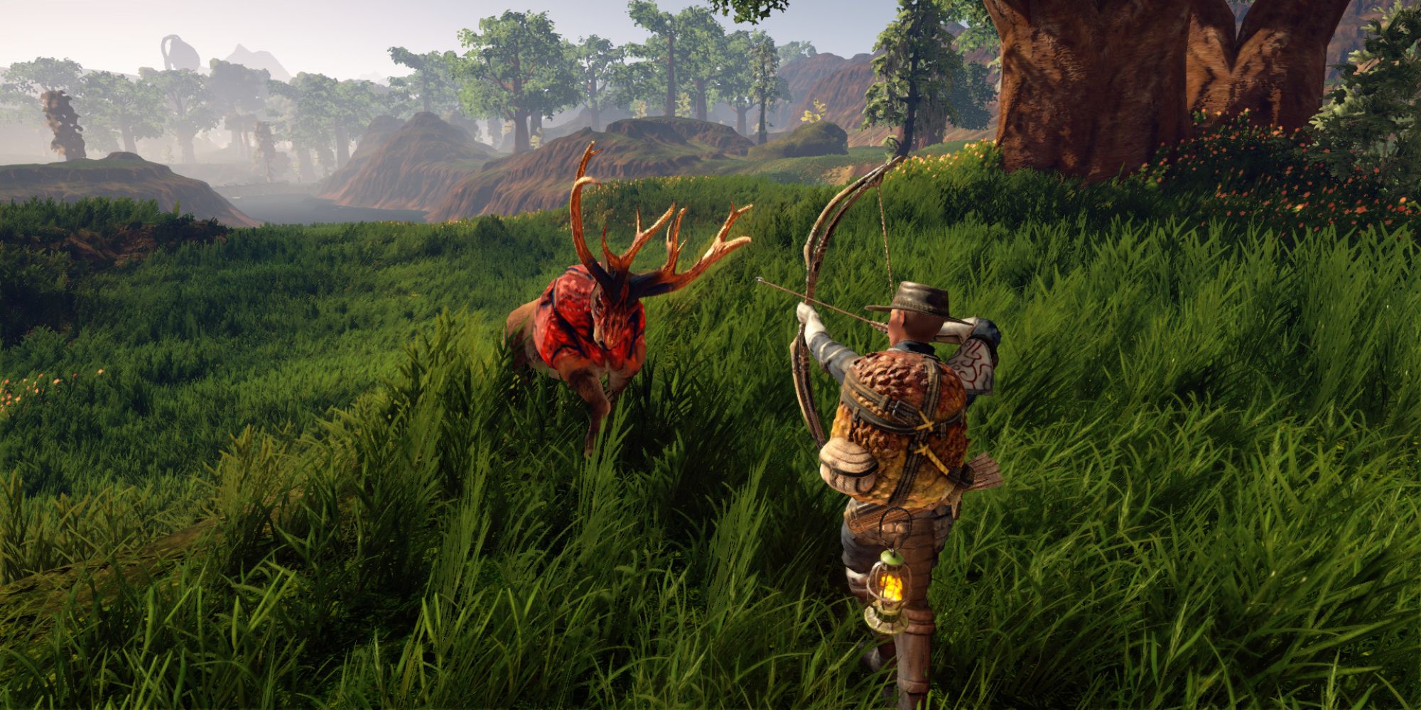 a wide shot of a hunter aiming their bow at an incoming red deer in a vast verdant valley filled with tall grass and trees