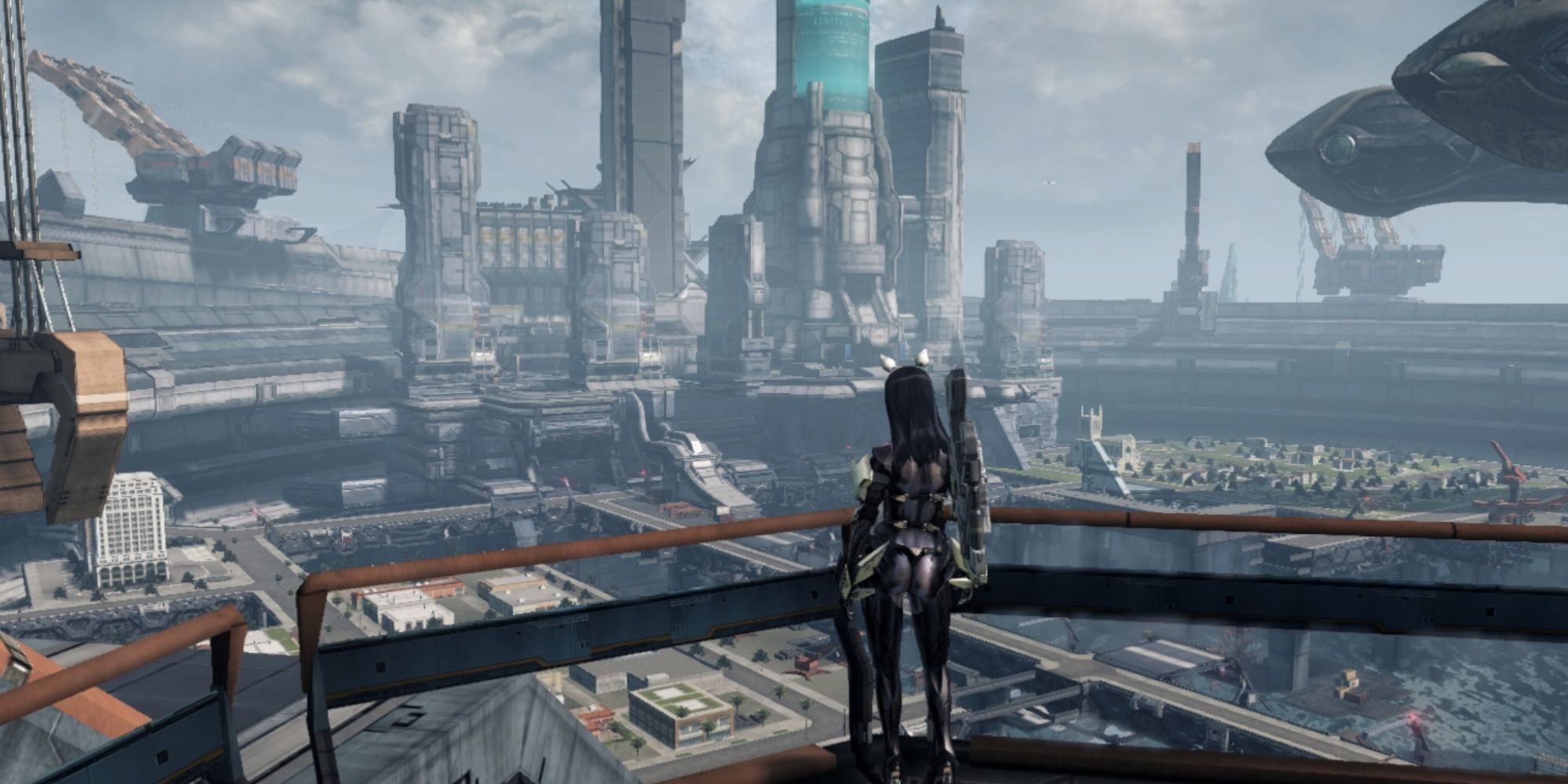 wide shot of New LA from Xenoblade Chronicles X showing a female character looking out over a city with tall buildings rising in the distance