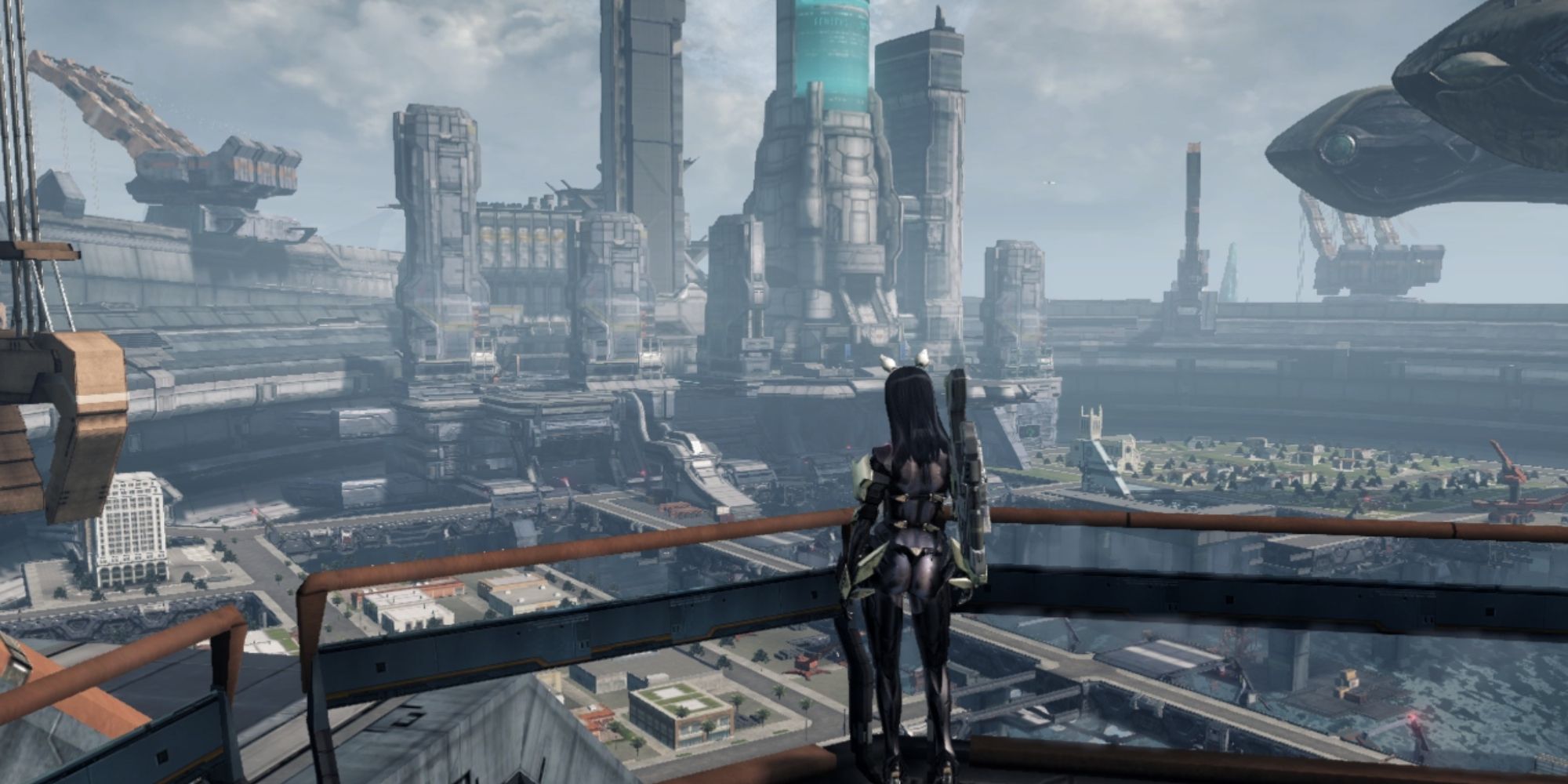 a wide shot of New LA from Xenoblade Chronicles X showing a female character overlooking the city with towering buildings looming in the distance